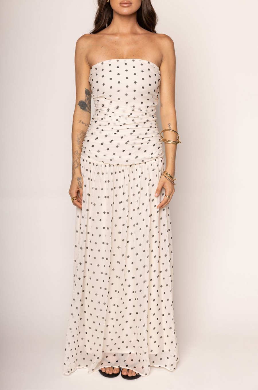 Chiffon polka dot maxi dress
Strapless
Tube top
Side cinching
Inner rubber grip lining
Back zipper closure
Lined
Cream and black polka dot maxi dress
bridal dress
Summer maxi dress