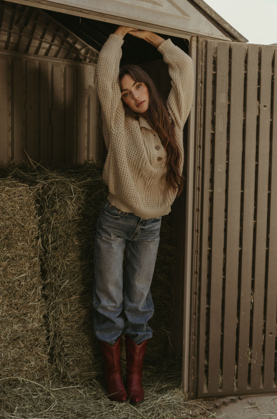 Fuzzy mixed knit crochet sweater. Collar neckline. Front button closures. Long sleeves. Banded hems. Unlined. tan sweater. knit sweater. quarter button up sweater