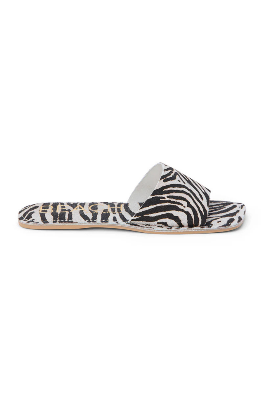 One-band zebra suede printed slide sandal
Squared toe
Padded insole
Suede/Synthetic
zebra slide sandals