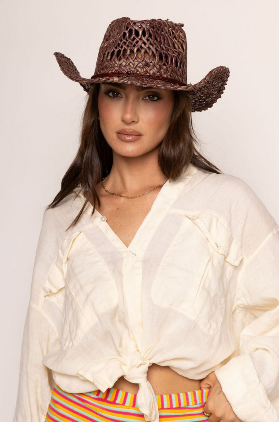 brown Raffia cowboy hat
Not bendable