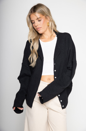 Fuzzy knit cardigan
Crewneck
Front button down closures
Long sleeves
Unlined
black basic cardigan
fall cardigan
fall sweater
fall outfit