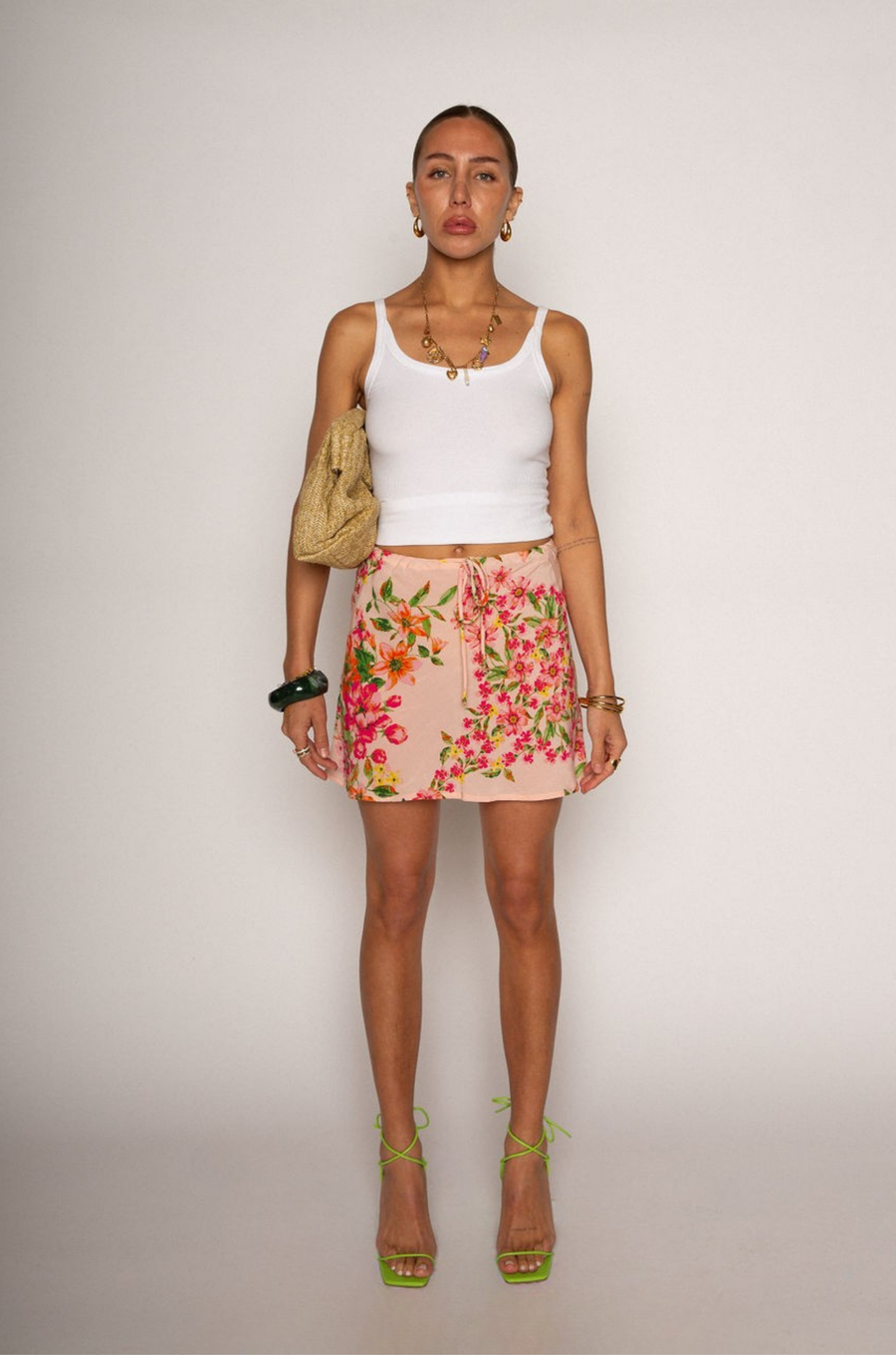 Floral printed mini skirt
Adjustable drawstring closure
Unlined
summer mini skirt