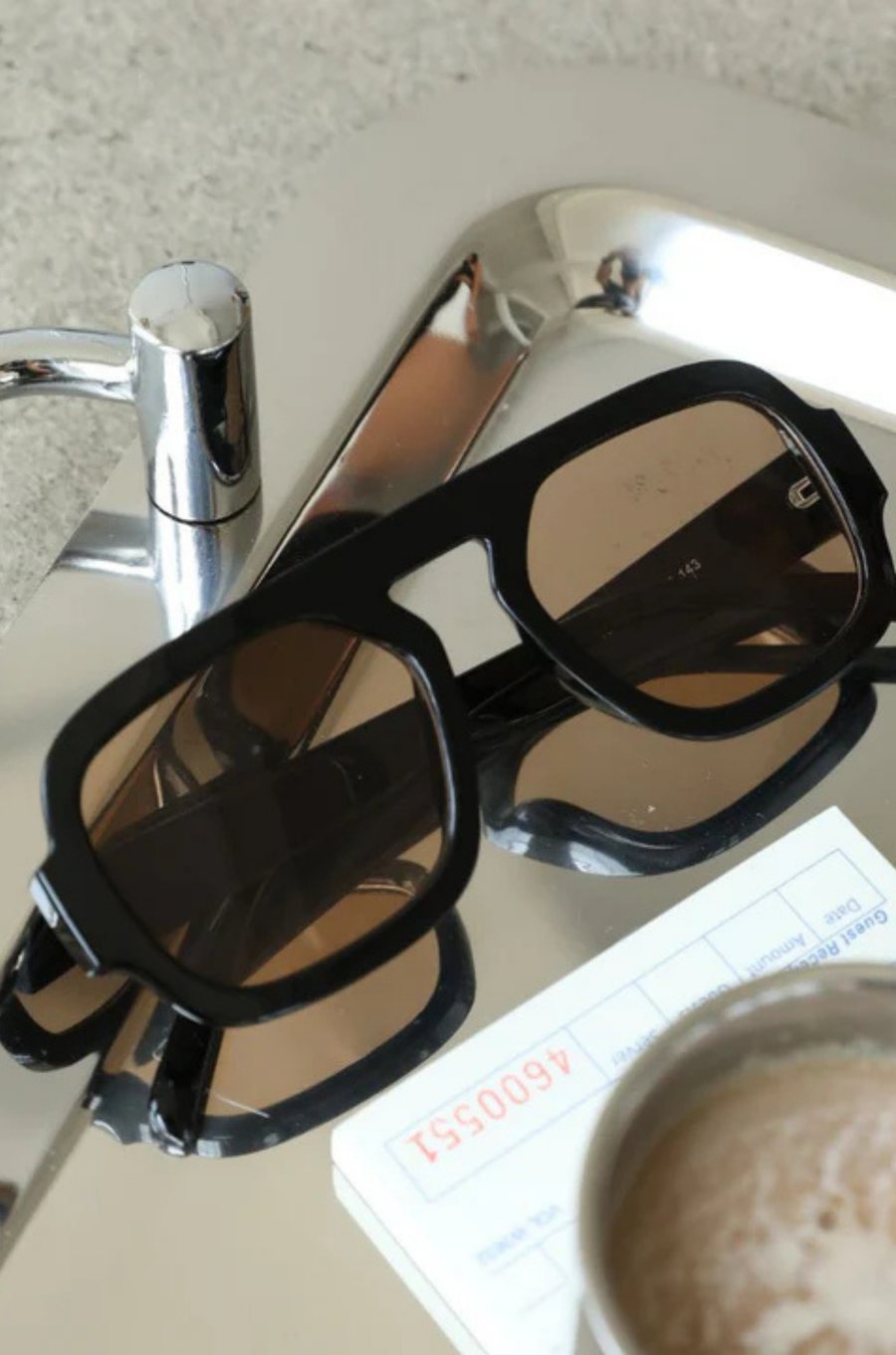 A modern take on a retro classic sunglasses.
Large frame.
Sleek black rims and softly tinted lenses for a lighter, cooler vibe.
Effortlessly stylish and endlessly versatile, they add instant edge to any look—whether you're keeping it casual or turning heads.
black frame sunglasses with brown lens
iris from love island