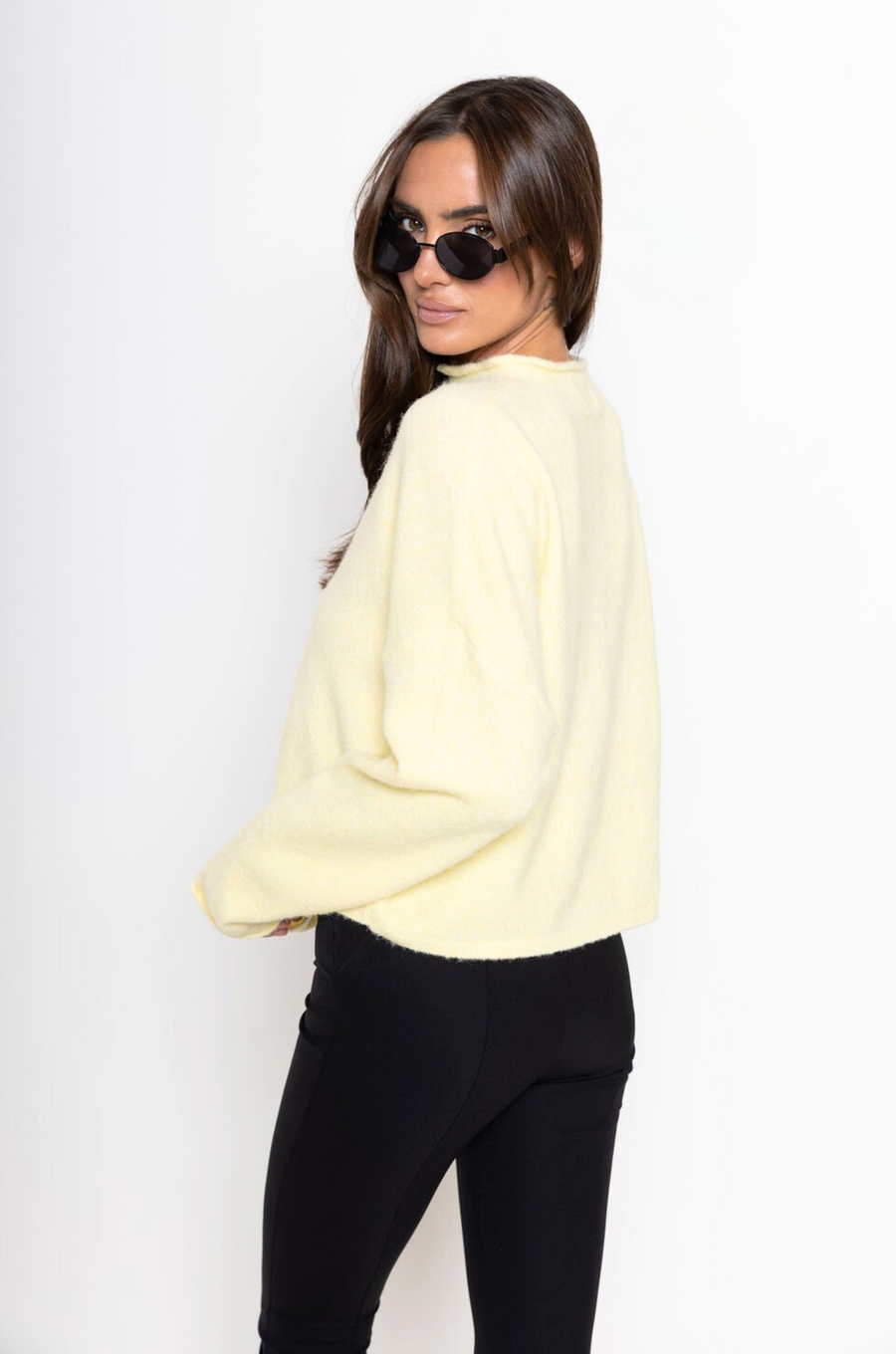 Fuzzy knit cardigan
Crewneck
Front button down closures
Long sleeves
Unlined
yellow cardigan