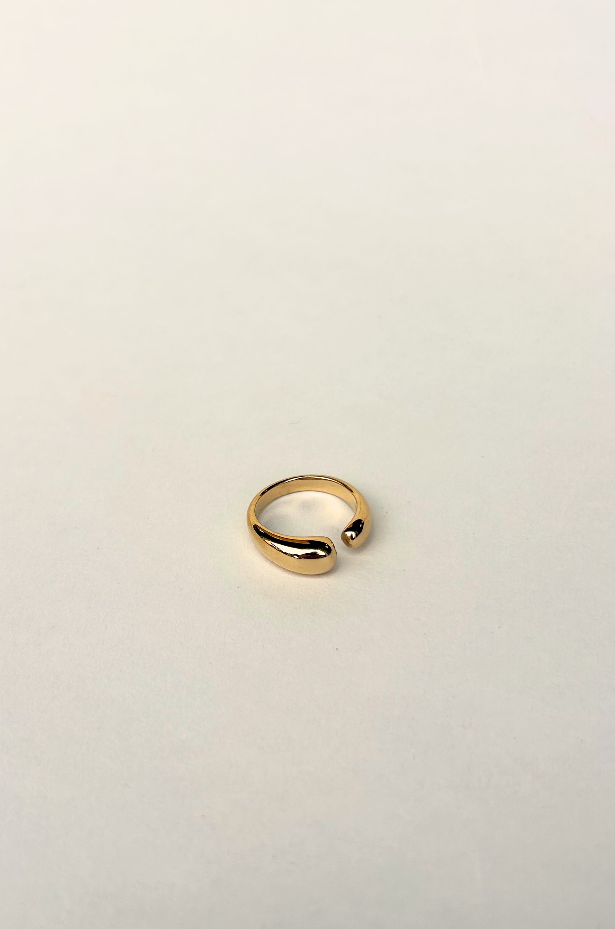 Gold dipped asymmetrical ring with opening
14k gold plating