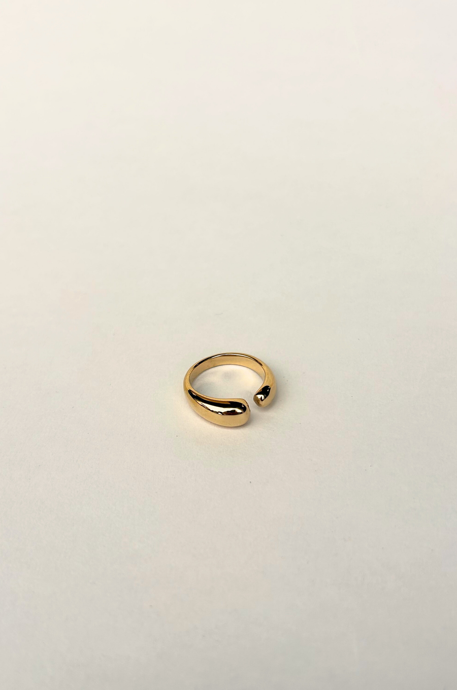 Gold dipped asymmetrical ring with opening
14k gold plating
