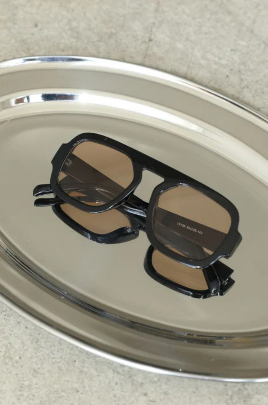 A modern take on a retro classic sunglasses.
Large frame.
Sleek black rims and softly tinted lenses for a lighter, cooler vibe.
Effortlessly stylish and endlessly versatile, they add instant edge to any look—whether you're keeping it casual or turning heads.
black frame sunglasses with brown lens
iris from love island