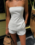 TOP
Curvy waist top
Tube top
Strapless
Smoked back
Back zipper closure
Inner rubber grip lining

BOTTOM
High waisted shorts
Side pockets
Lined

white tube top and short set