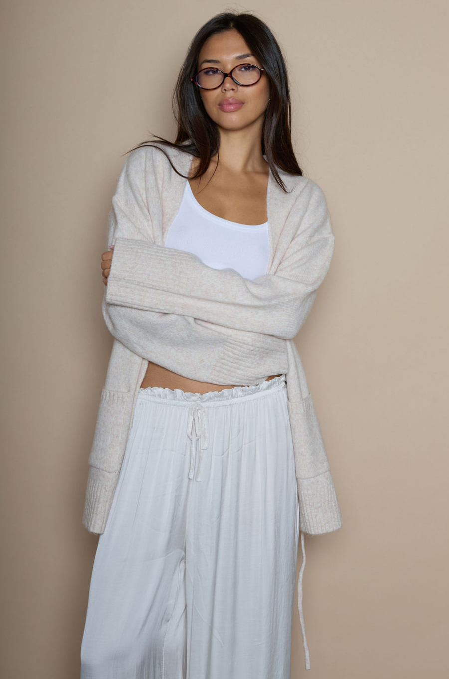 Fuzzy marled knit cardigan. Open front. Long sleeves. Front pockets. tan robe cardigan. cream robe cardigan. cute comfy outfit. cream cardigan. winter cardigan. fall cardigan