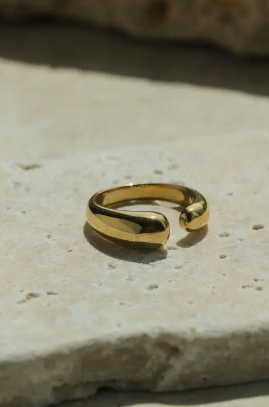Gold dipped asymmetrical ring with opening
14k gold plating