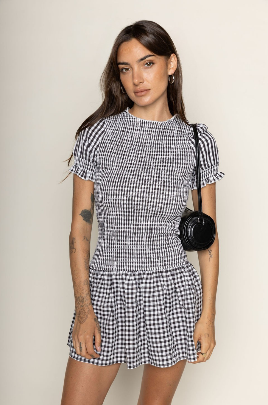 black and white Gingham printed smocked mini dress
Short sleeve
Has stretch
Unlined
Polyester
smocked bodice
summer mini dress
european summer outfit inspo