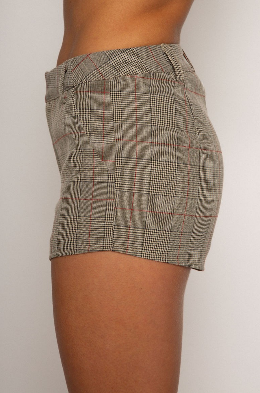 Plaid micro short. 2 pocket construction. Belt loop .Front zipper closure. Summer micro shorts. Spring micro shorts. Unlined