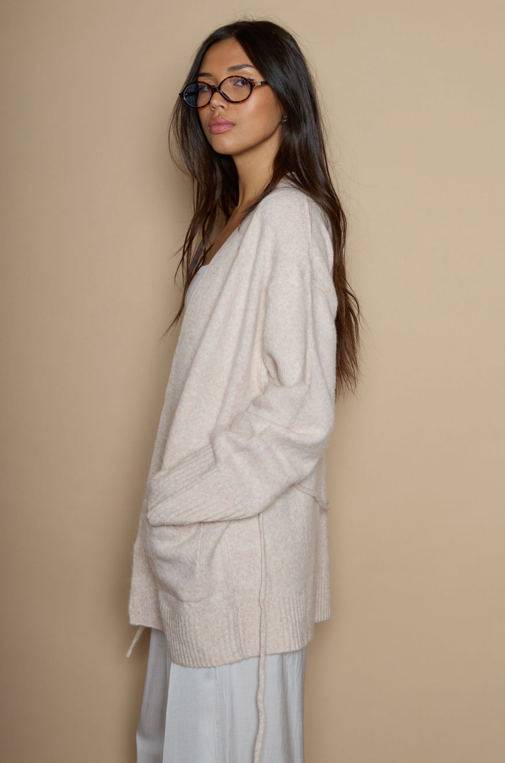 Fuzzy marled knit cardigan. Open front. Long sleeves. Front pockets. tan robe cardigan. cream robe cardigan. cute comfy outfit. cream cardigan. winter cardigan. fall cardigan
