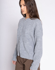 GREY Fuzzy ribbed knit cardigan
Button down closure
Crew neck
Unlined
Spring cardigan