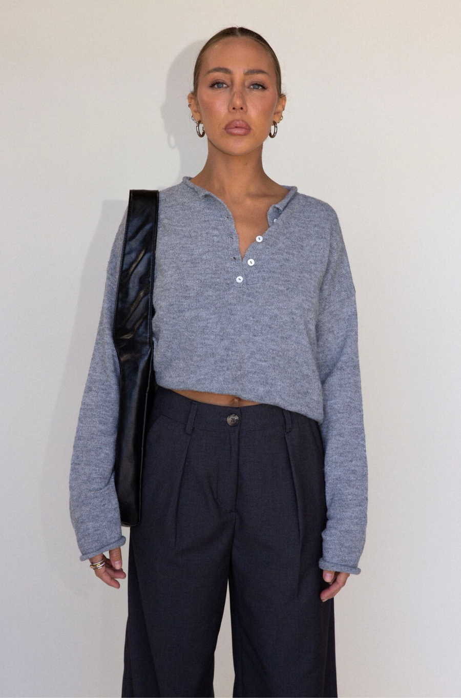 Fuzzy heather crochet knit sweater. Henley quarter neckline with button down closures. Long sleeves. Unlined. brown pullover. grey sweater. fall sweater. fall outfit