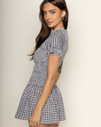 black and white Gingham printed smocked mini dress
Short sleeve
Has stretch
Unlined
Polyester
smocked bodice
summer mini dress
european summer outfit inspo