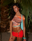 orange and pink Knit skirt
Elastic waist
Fully lined
Reversible
Polyester/Elastane
swim skirt