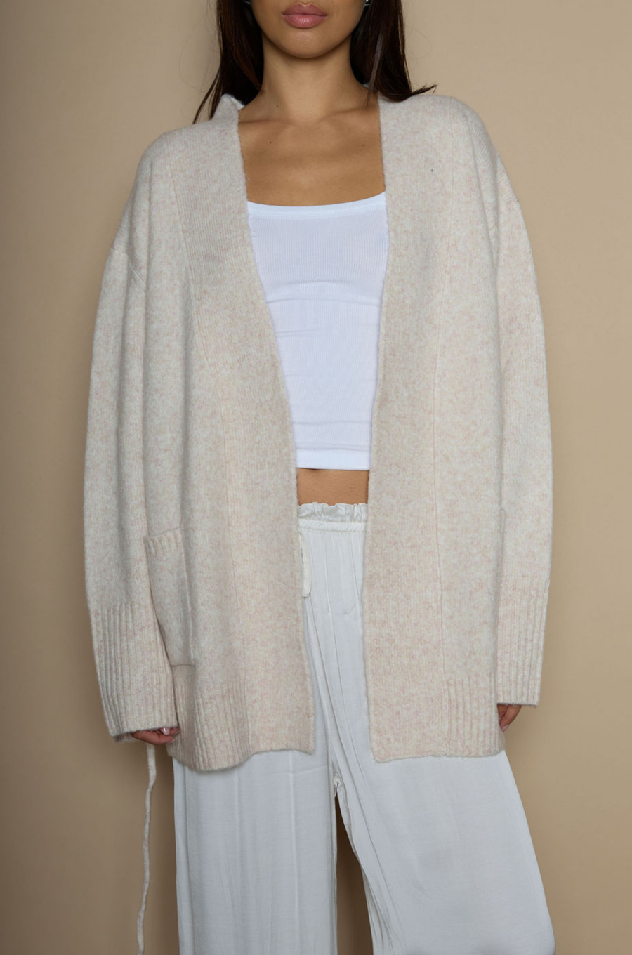 Fuzzy marled knit cardigan. Open front. Long sleeves. Front pockets. tan robe cardigan. cream robe cardigan. cute comfy outfit. cream cardigan. winter cardigan. fall cardigan