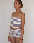 TOP:
Striped cropped cami tank top
Adjustable straps
Unlined
fourth of july outfit
summer lounge outfit
cute lounge outfit

BOTTOM:
Striped fold over shorts
Mini length
Elastic waistband
Has stretch
Unlined