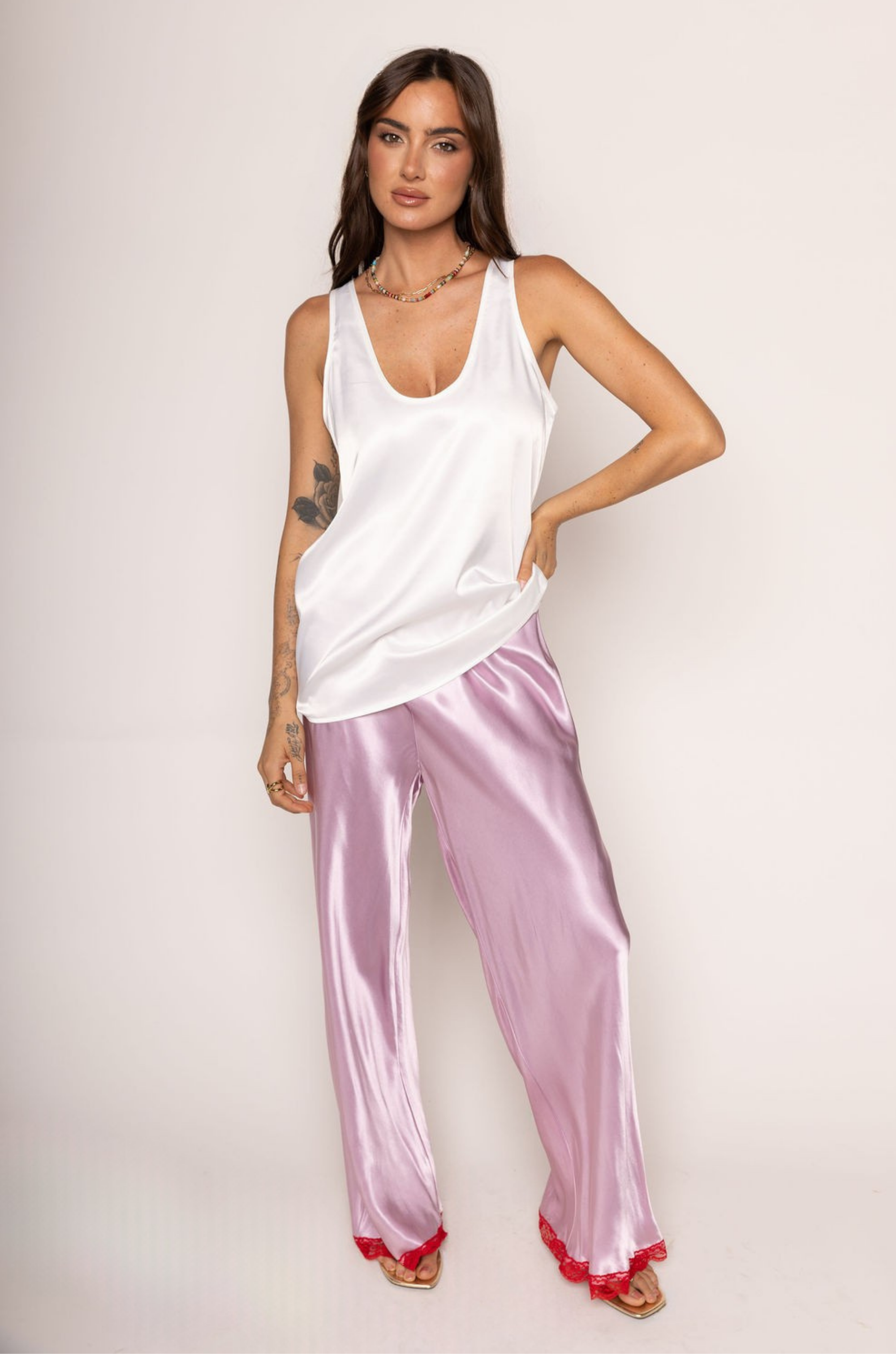 pink Satin pants
red Lace trim
Adjustable tie waistband
Unlined
Cute lounge pants
dressed up loungewear