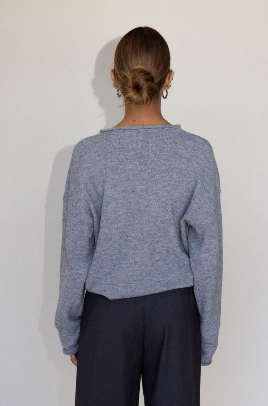 Fuzzy heather crochet knit sweater. Henley quarter neckline with button down closures. Long sleeves. Unlined. brown pullover. grey sweater. fall sweater. fall outfit