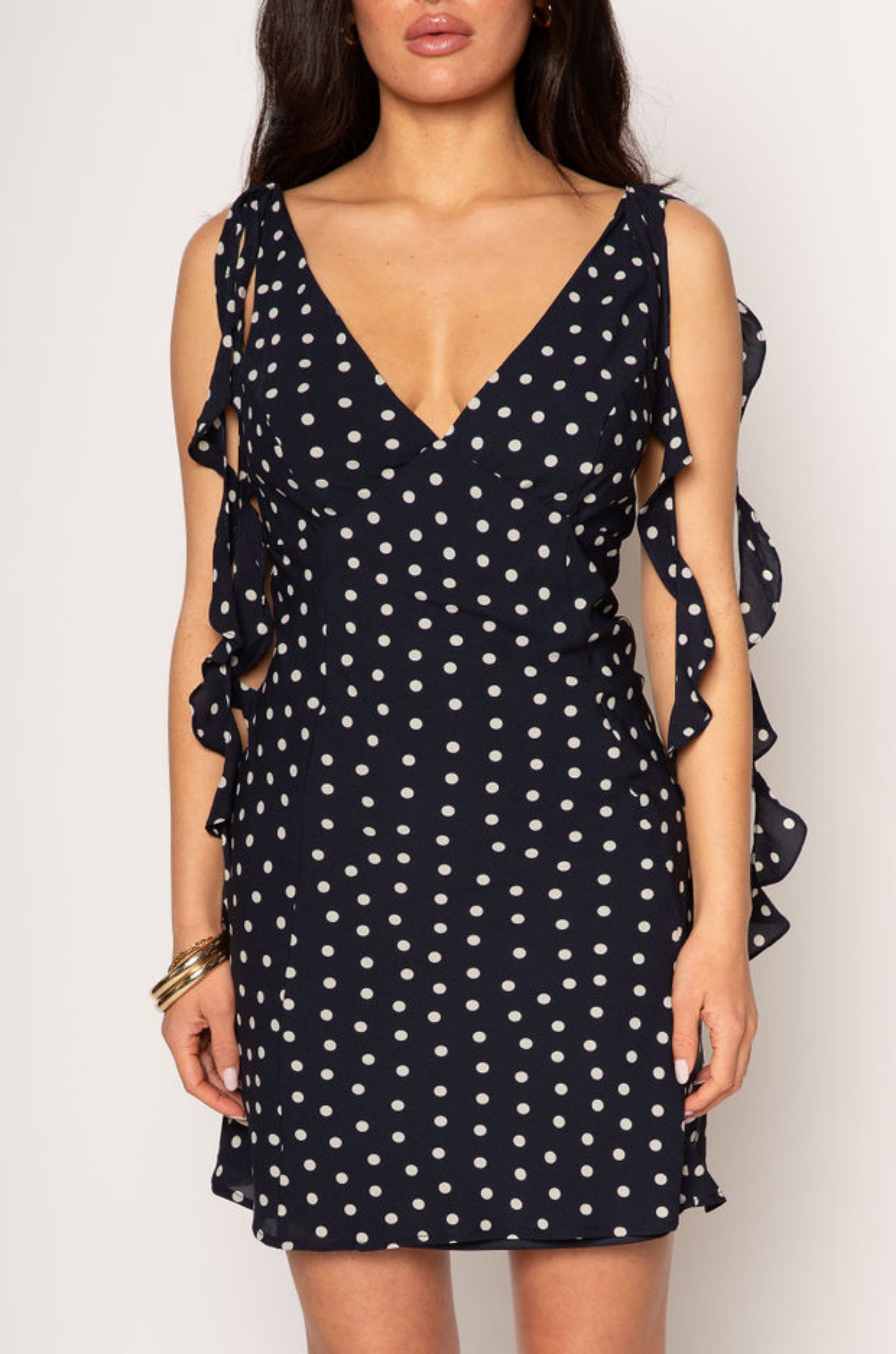 Polka dot chiffon mini dress. Adjustable straps. Back hook and eye and zipper closures. Fully lined. Ruffle trim. polka dot mini dress. summer dress. spring dress. 