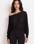 black Long sleeve sheer sweater
Boat neckline
Unlined/Sheer