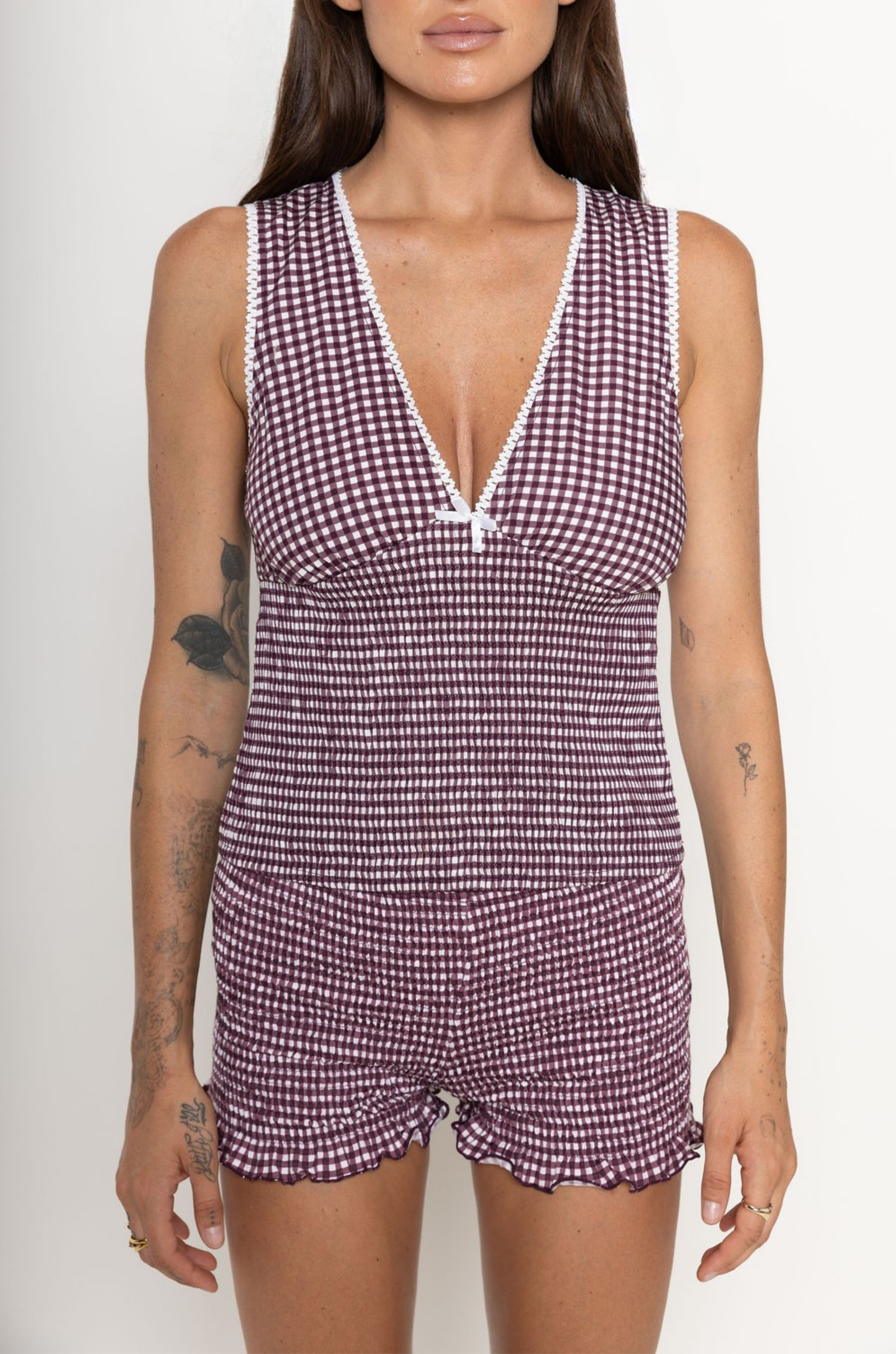 burgundy Gingham printed mini shorts
Low-rise hot pants
Shirring detail
Elasticated waist
Frill along the hem