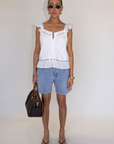 white Eyelet woven top
Button down closure
Lace detailing
Flare hem
Partially lined
summer top