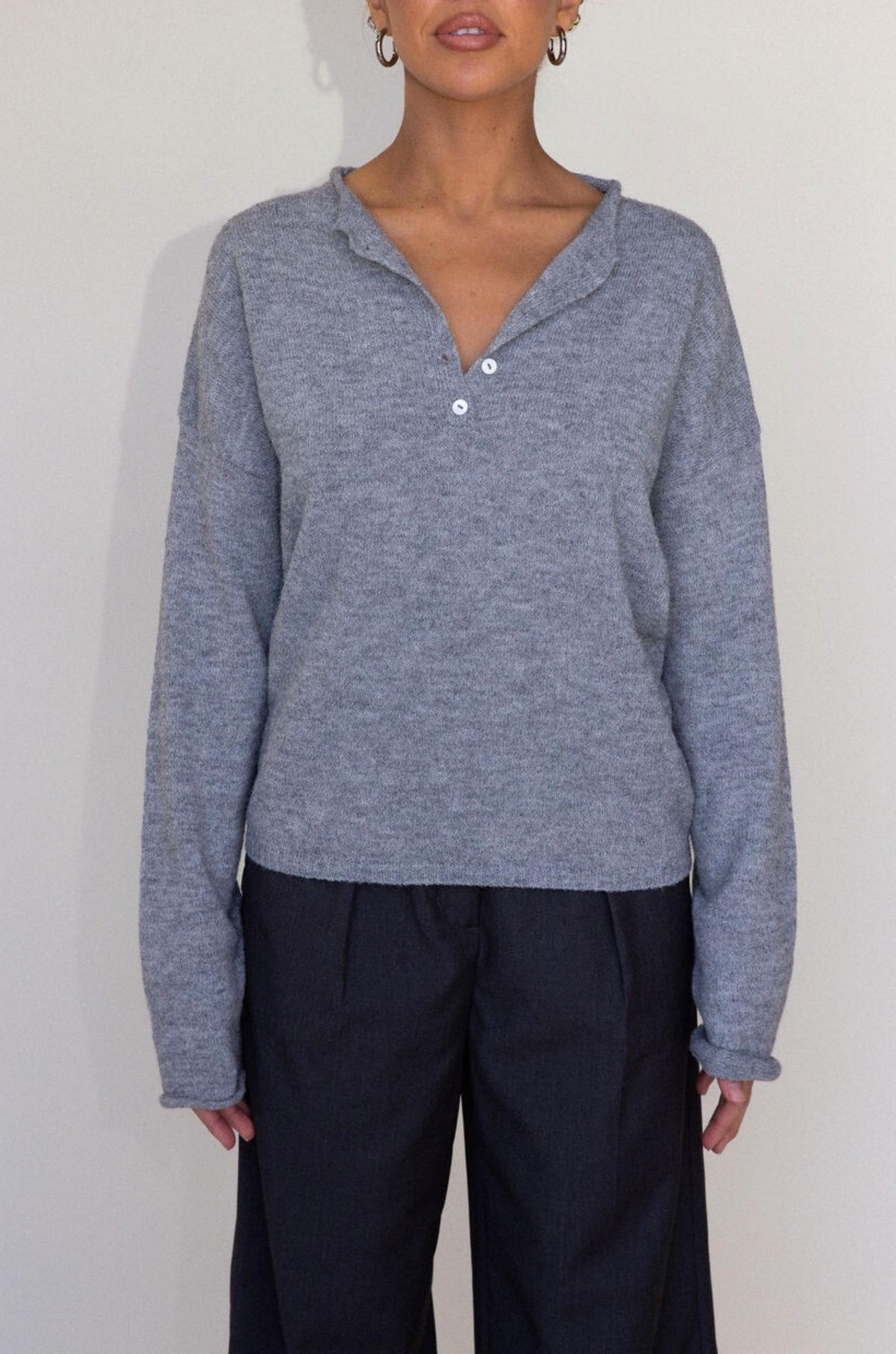 Fuzzy heather crochet knit sweater. Henley quarter neckline with button down closures. Long sleeves. Unlined. brown pullover. grey sweater. fall sweater. fall outfit