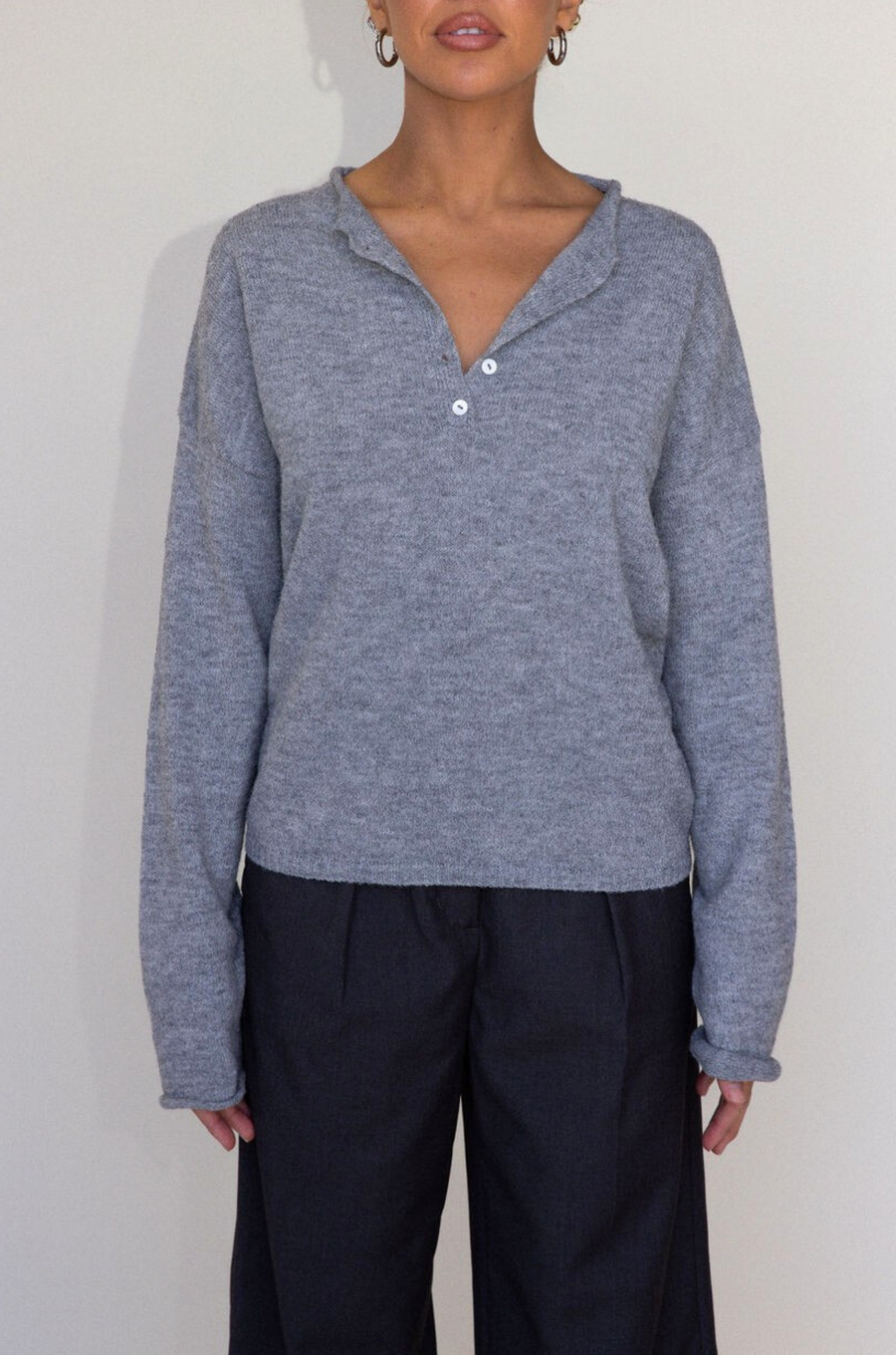 Fuzzy heather crochet knit sweater. Henley quarter neckline with button down closures. Long sleeves. Unlined. brown pullover. grey sweater. fall sweater. fall outfit