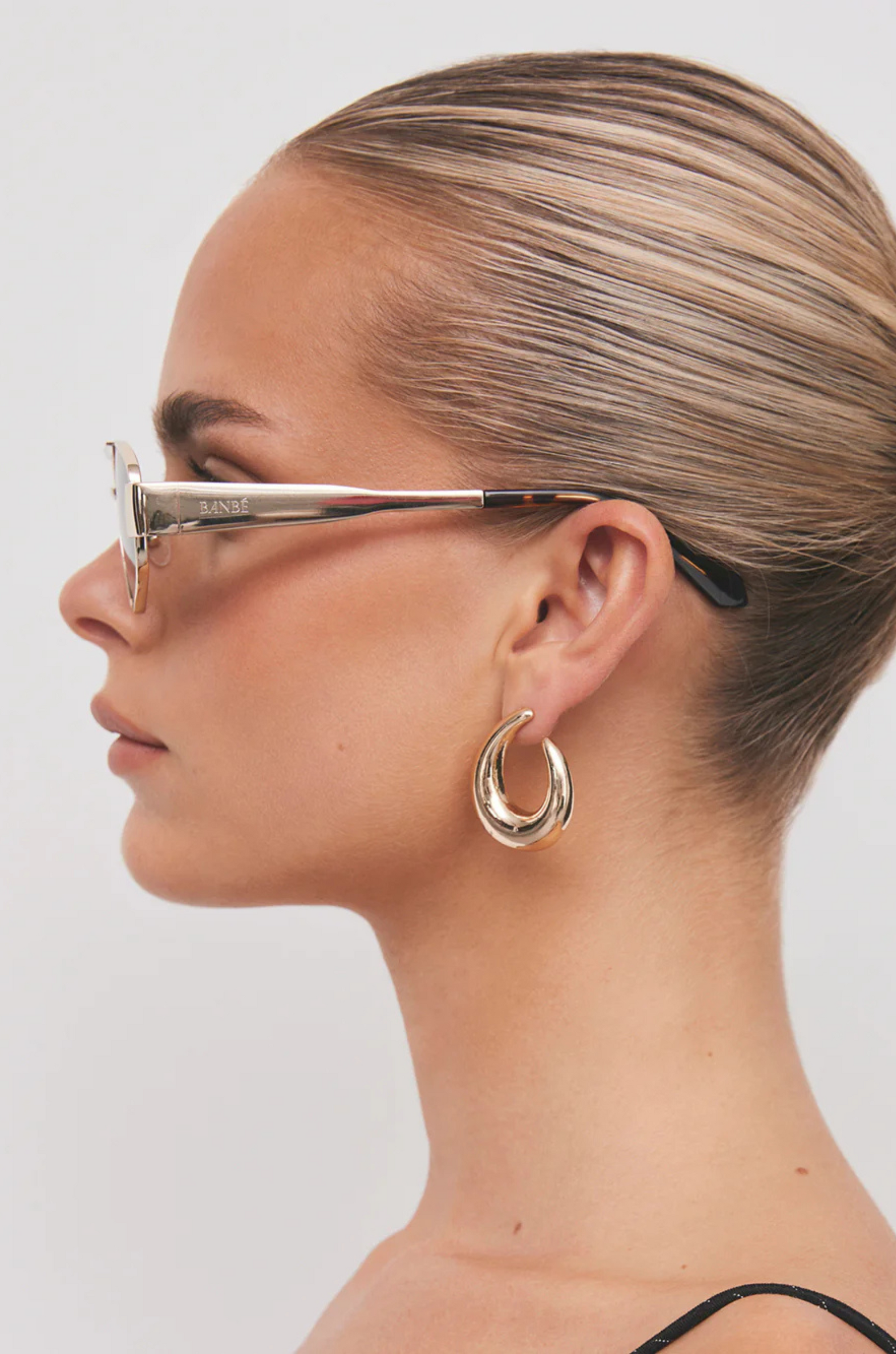 gold black and green Aviator-style sunglasses