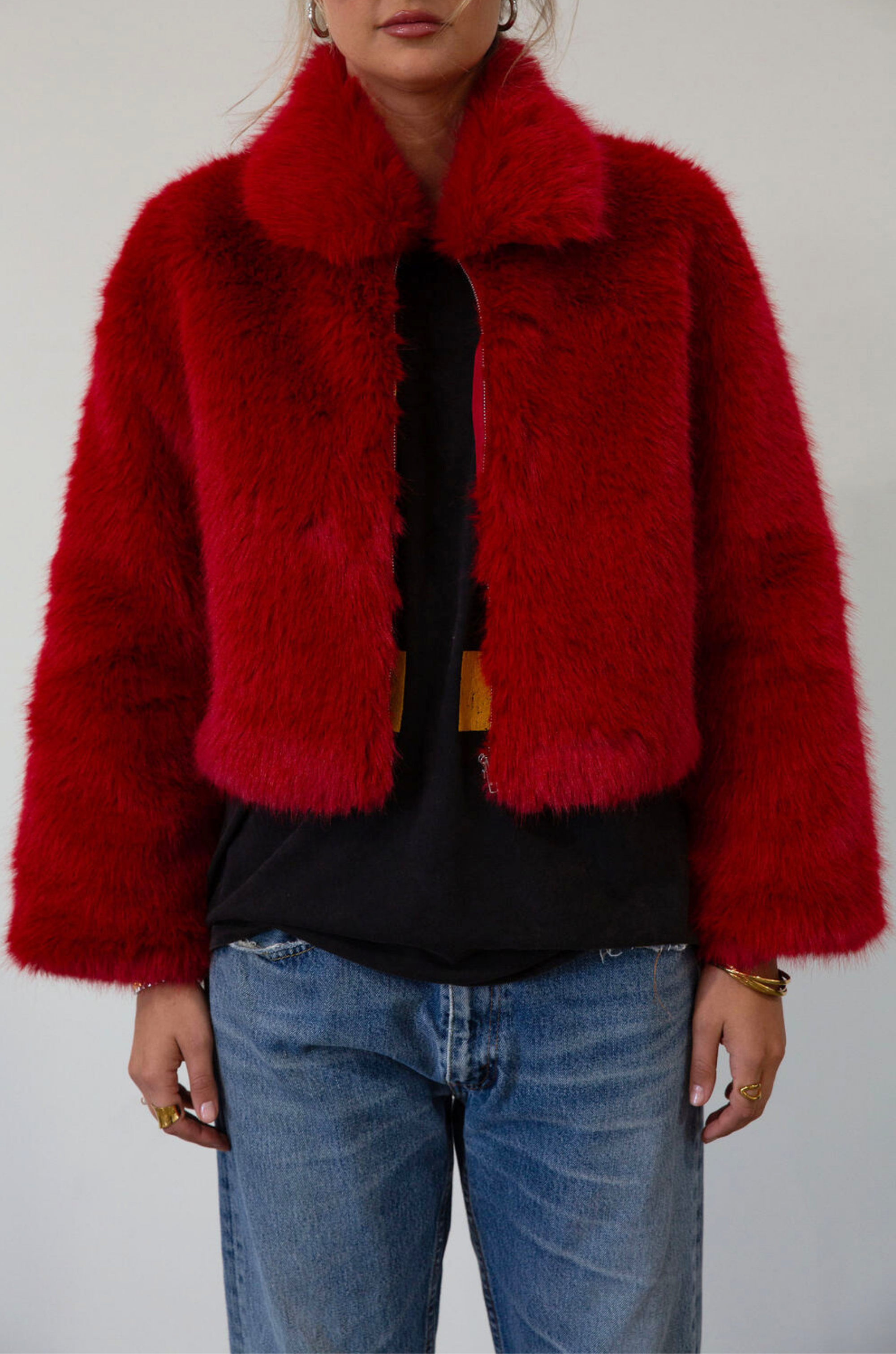 Faux fur coat. Collar neckline. Front zipper closure. Side pockets. Fully lined. red fur coat. fall coat. winter coat. red faux fur coat