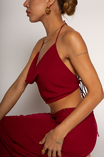 Halter crop top. Adjustable neck and back tie strap. Cowl neck. Partially lined. Maxi skirt. Hidden side zipper. Lined. red skirt set. cherry red skirt set. going out set. nice dinner set. summer outfit. spring outfit.