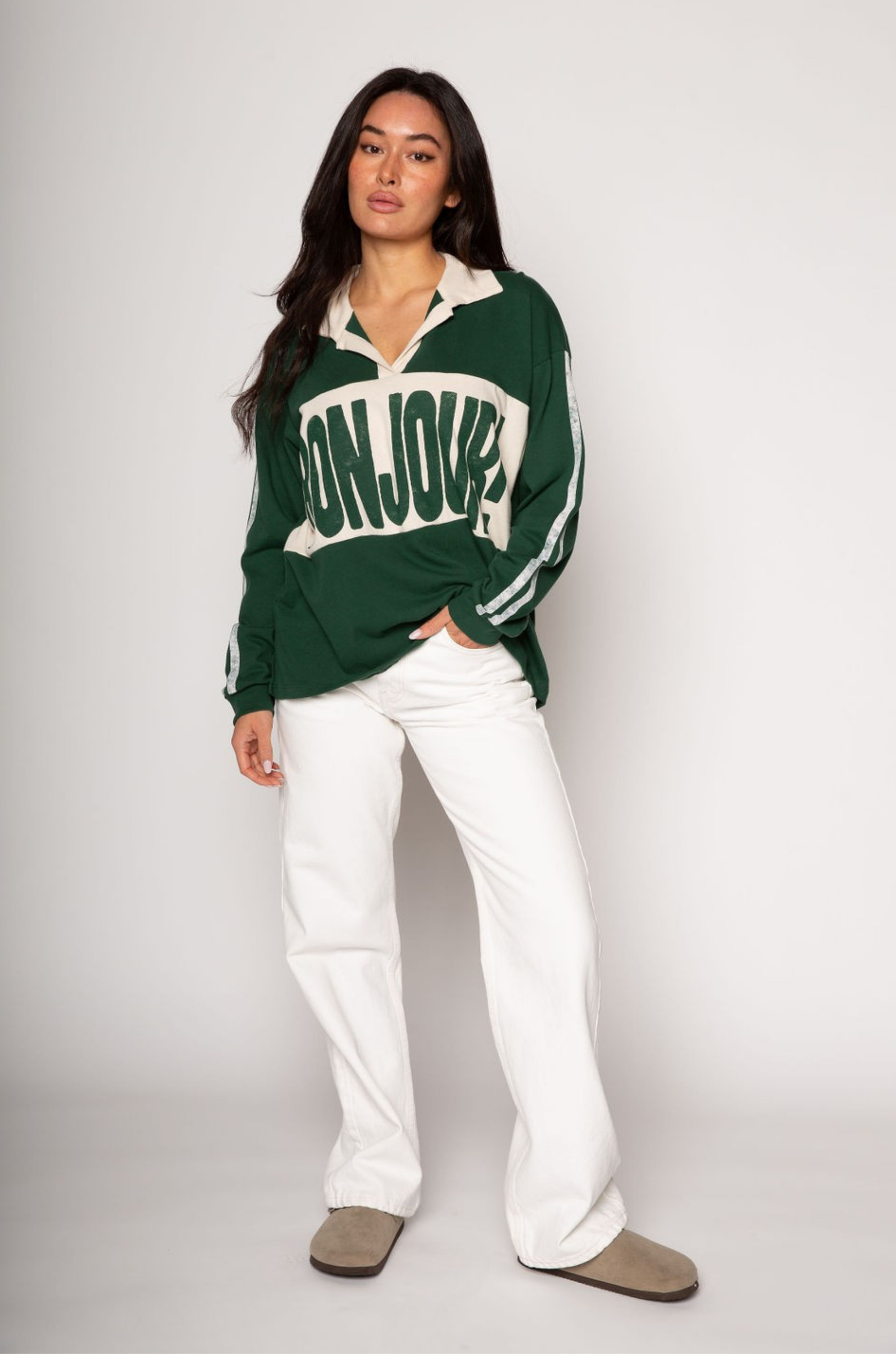 Graphic printed knit top. Collar neckline. Long sleeves. Unlined. green graphic long sleeve tee. bonjour tee
