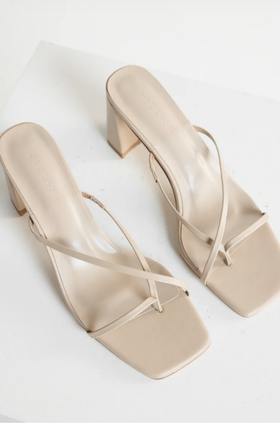cream stone Cross over strap heels
Squared toe
Block heel