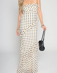 Polka dot printed maxi dress
Tube top
Ruffle on bust trim
Asymmetric ruffle detail on bottom half
Back cut out
Inner rubber grip lining
Side zipper closure
Lined
cream and black polka dot dress
bridal maxi dress