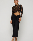 black Shirred maxi skirt
Elastic stretch waist with front tie cinch
Zipper up back closure
Polyester