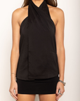 Twisted halter top
Open back
Hook and eye neck closure
Lined
black wrap halter top
fall outfit
thanksgiving outfit