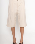 Pleated trouser jorts
Longline shorts
2 side pockets
2 faux back pockets
Button and fly closure
tan jorts
tan trouser jorts
trendy jorts
fall transition outfit