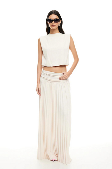 Knit maxi skirt. Elastic wide waistband. Pleated skirt. Fully lined. Slightly sheer. white mxi skirt. white lioness skirt. 