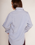 blue and white Striped oversized button down shirt
Collared
Front chest pocket
Long sleeve
Button down closure
Unlined