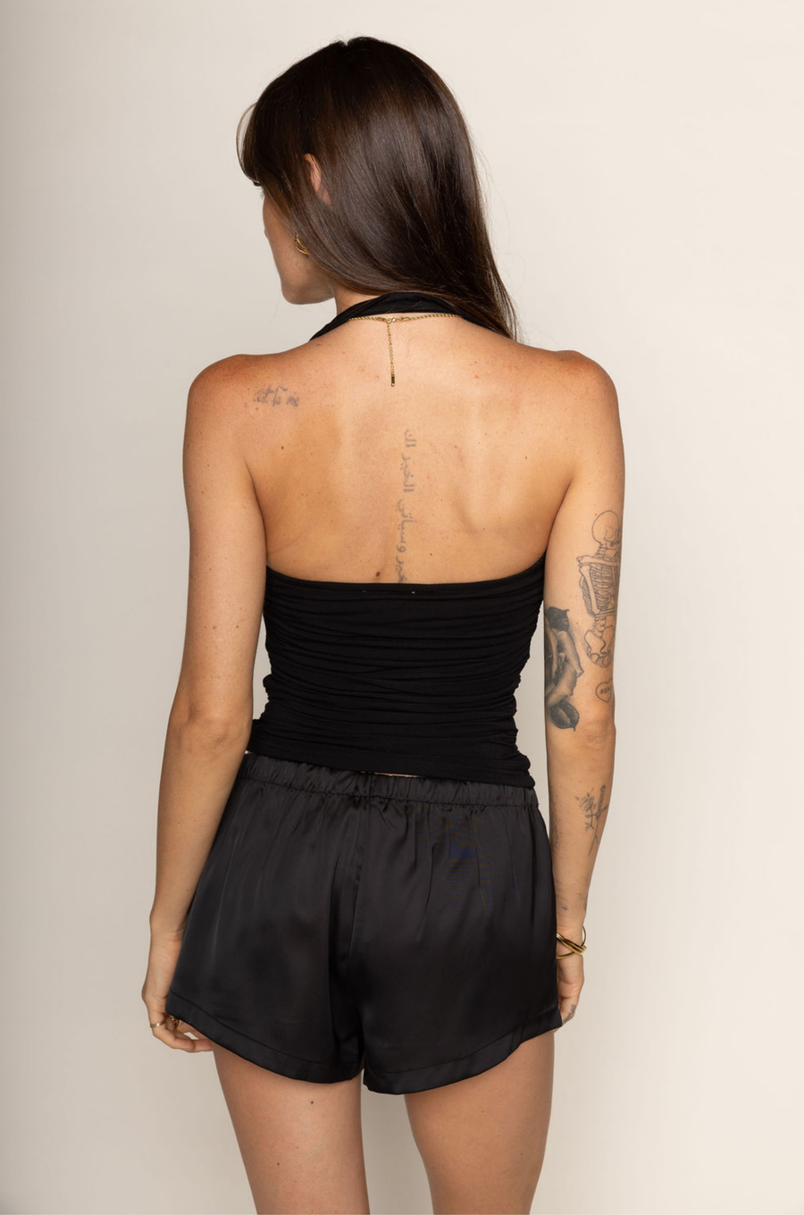 black Jersey knit halter top
Ruched bodice
Lined
basic black halter top