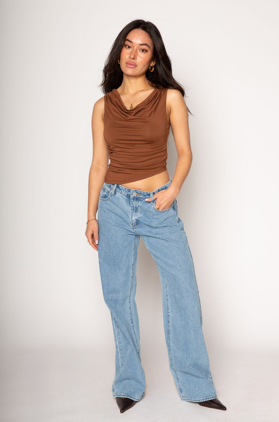 Knit ruched asymmetric top. Sleeveless. Open back with tie closure. Elastic back. Partially lined. going out top. brown cowl neck tank top. 