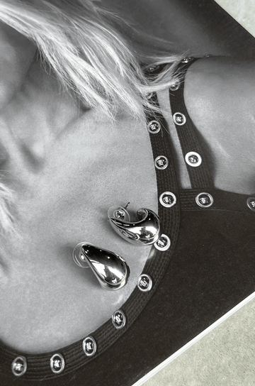 silver Thick teardrop earrings. Post back closure.