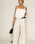 cream ivory Wide leg gathered pants
Belt loops
Eye hook and zipper closure
Comes with a black belt
Unlined
wide leg work slacks
office wear
work pants
