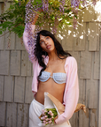 pink Fuzzy knit cardigan
Crewneck
Front button down closures
Long sleeves
Unlined
Length: 21"
Recycled Polyester/Wool/Acrylic/Spandex