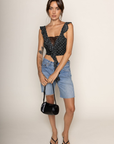Polka dot mesh cropped tank top
Cascading ruffles
Sheer lace pane
V-neckline
Sleeveless
polka dot crop top
going out top