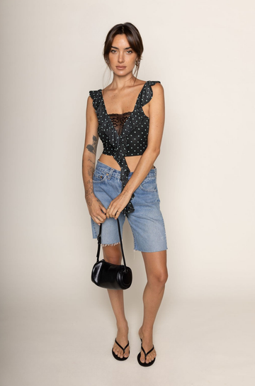 Polka dot mesh cropped tank top
Cascading ruffles
Sheer lace pane
V-neckline
Sleeveless
polka dot crop top
going out top