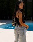 black Satin tank top
A line
Adjustable spaghetti straps
Partially lined